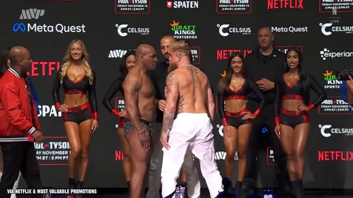 Jake Paul and Mike Tyson at press conference.