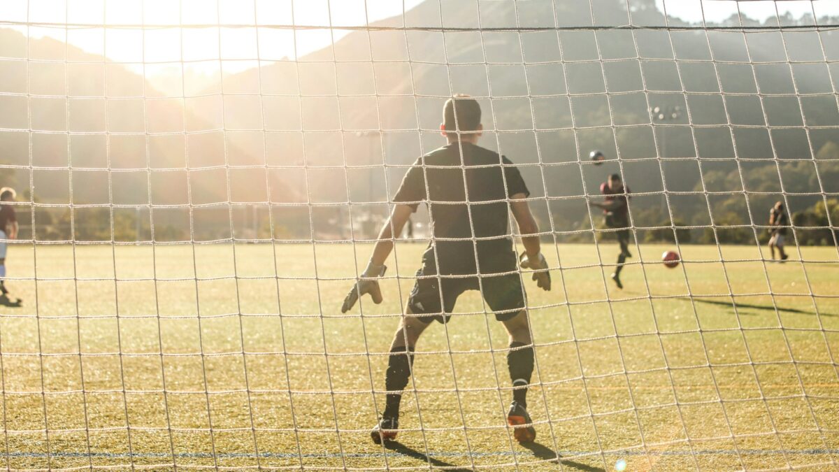 men playing soccer