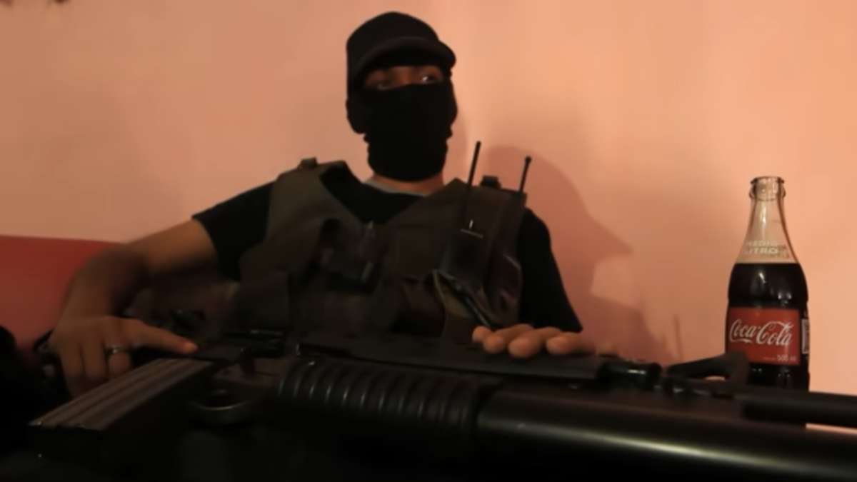 Cartel member wearing mask