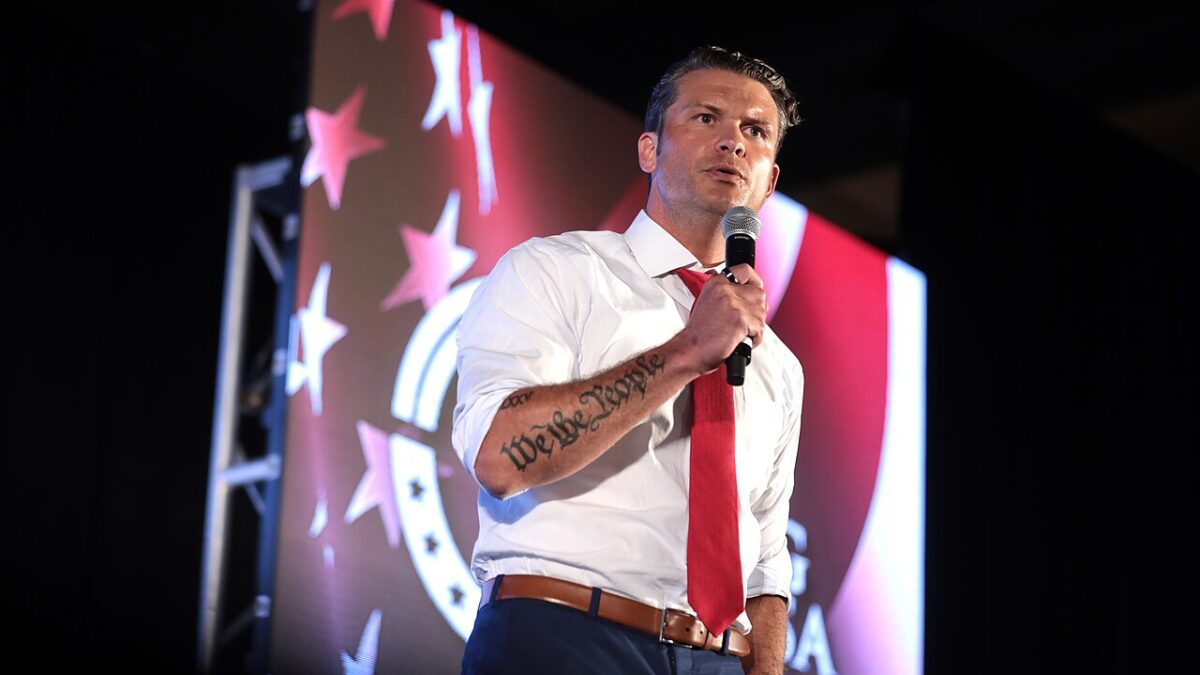 Pete Hegseth speaking onstage