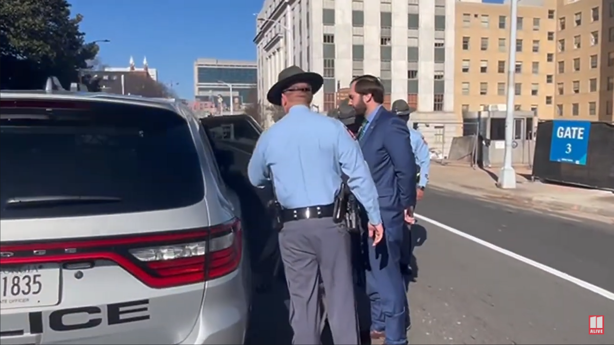 Sen. Colton Moore getting arrested.