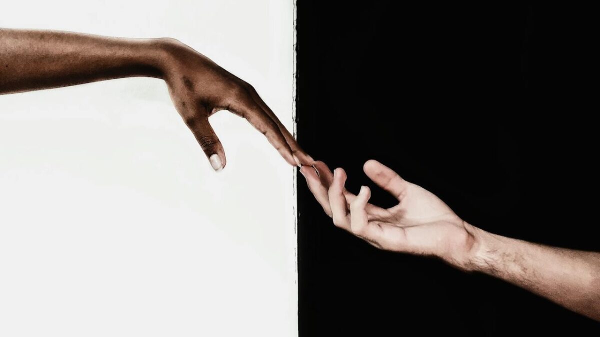 hands on white and black background