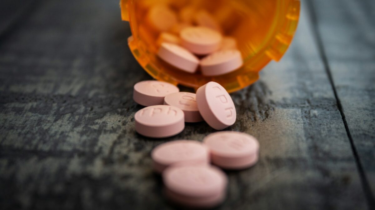 pills spilling out of orange container