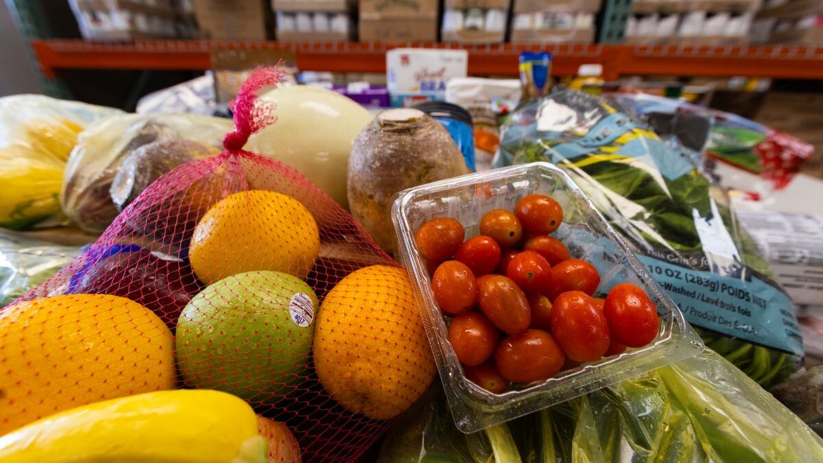 a stack of fruits and vegetables.