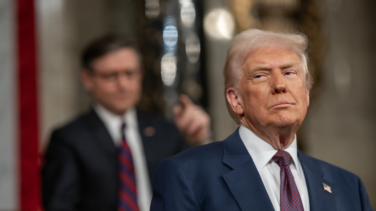 Trump addresses congress with Mike Johnson in the blurred background