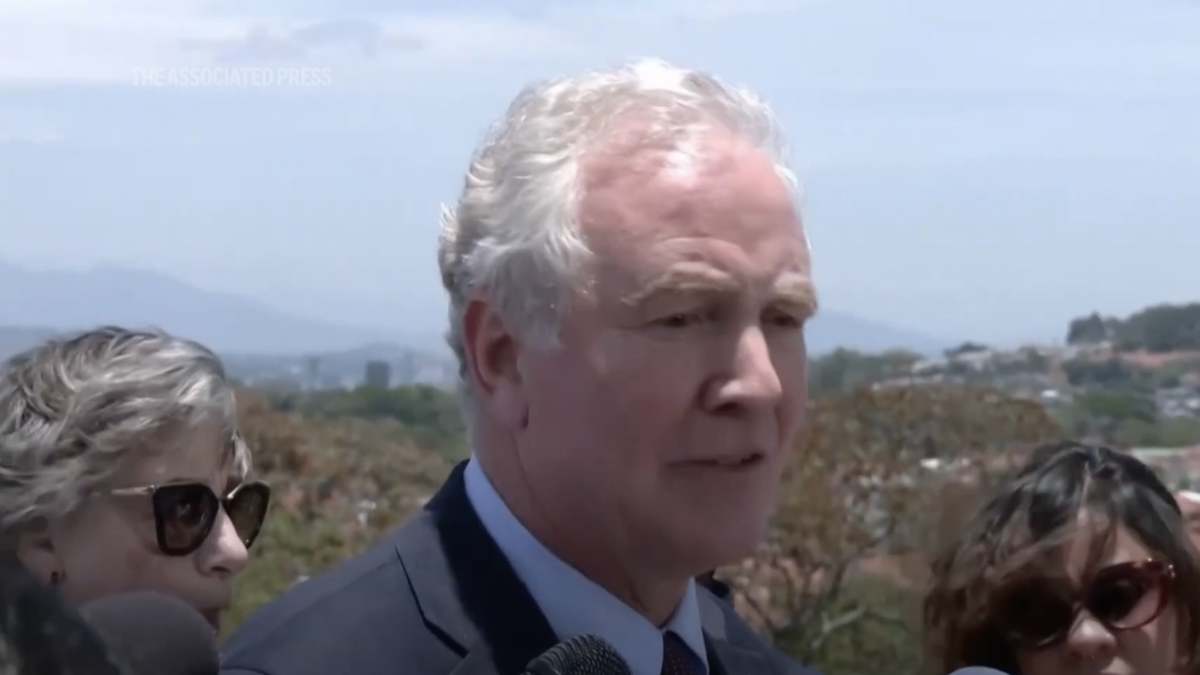 Sen. Christopher Van Hollen speaks with reporters -- lots and lots of reporters -- in El Salvador.