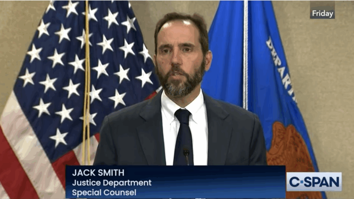 Jack Smith holding. a press conference