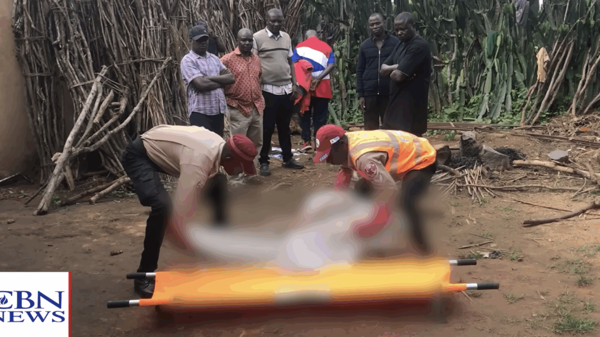 Men digging grave in Nigeria village