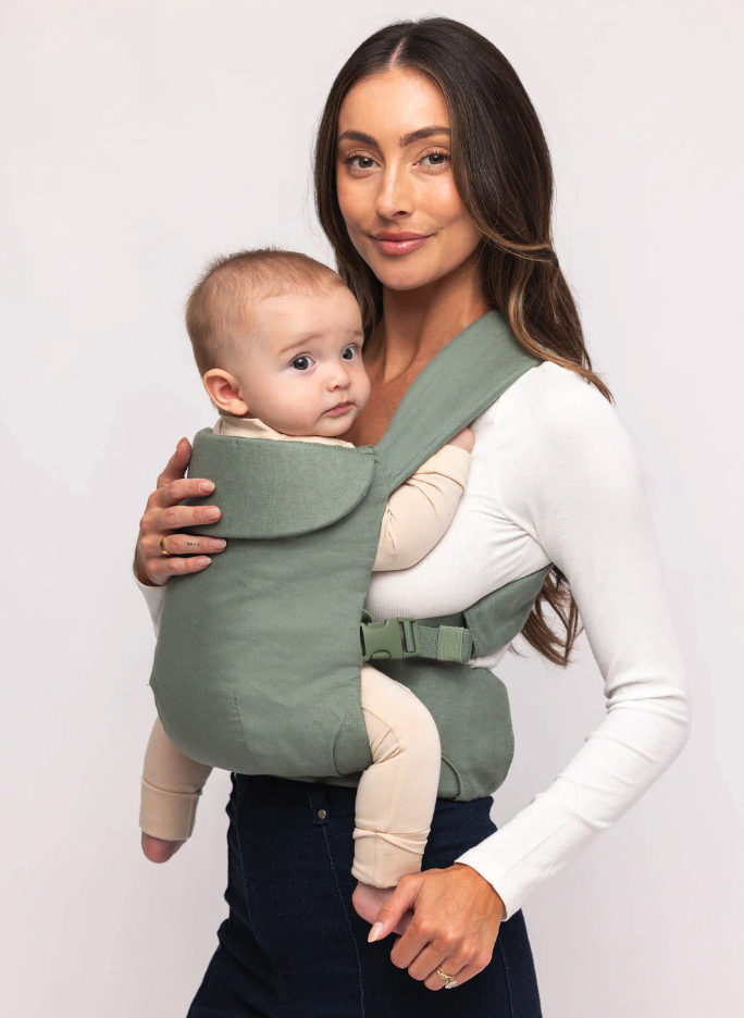 mom with baby in a bay carrier