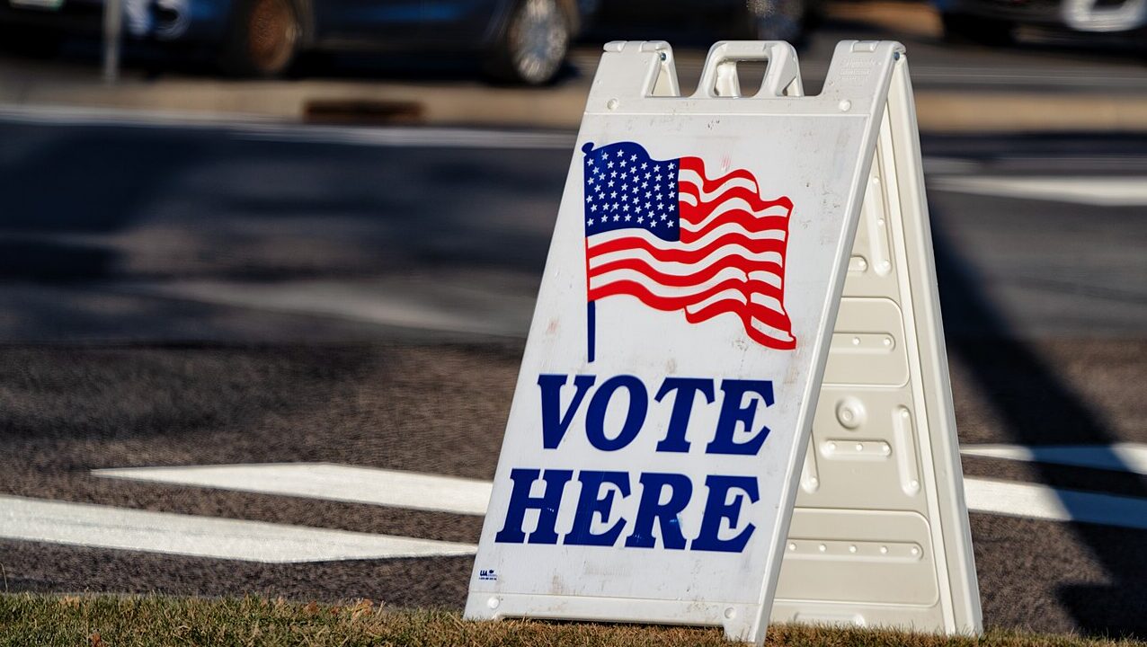 headline: Feds Charge Two With Illegally Voting Months After